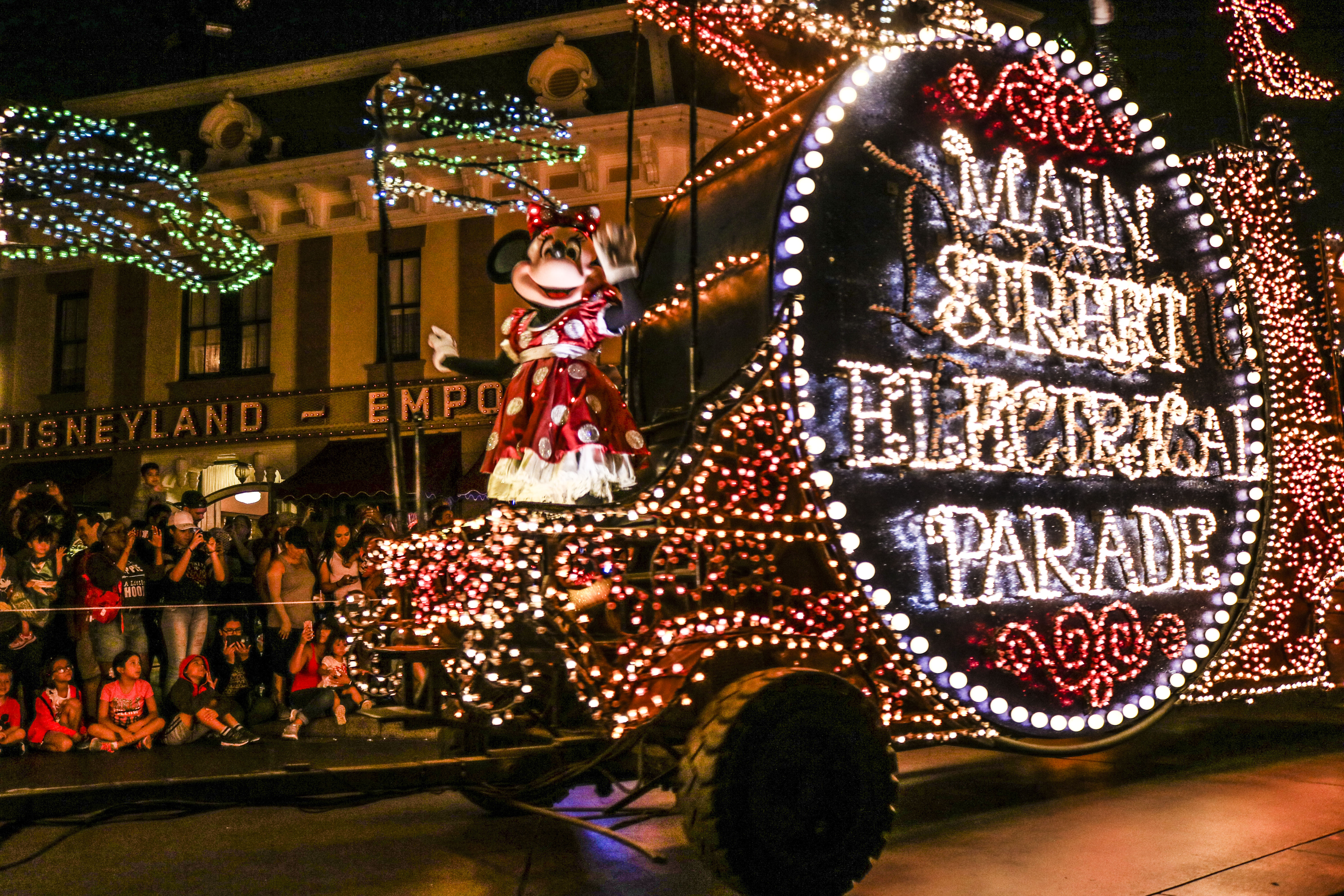 Minnie greets guests during the Main Street Electrical Parade at Disneyland. 